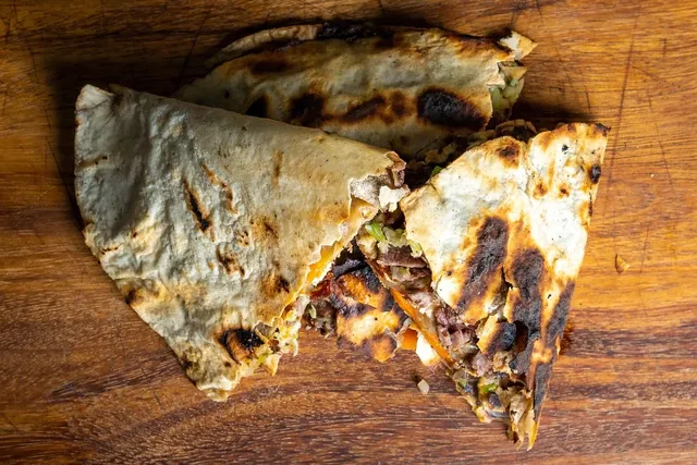 Load image into Gallery viewer, Caramelo Sonoran-Style DUCK Fat Tortillas (12 ct.)